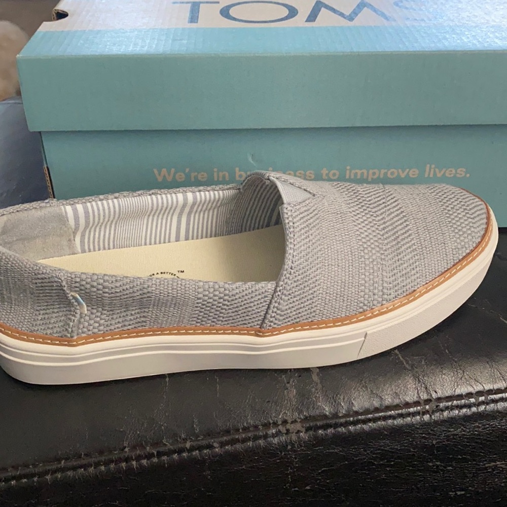 Tom’s brand new slip on runs little small